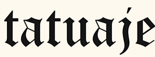 Stylised black gothic text logo reading tatuaje